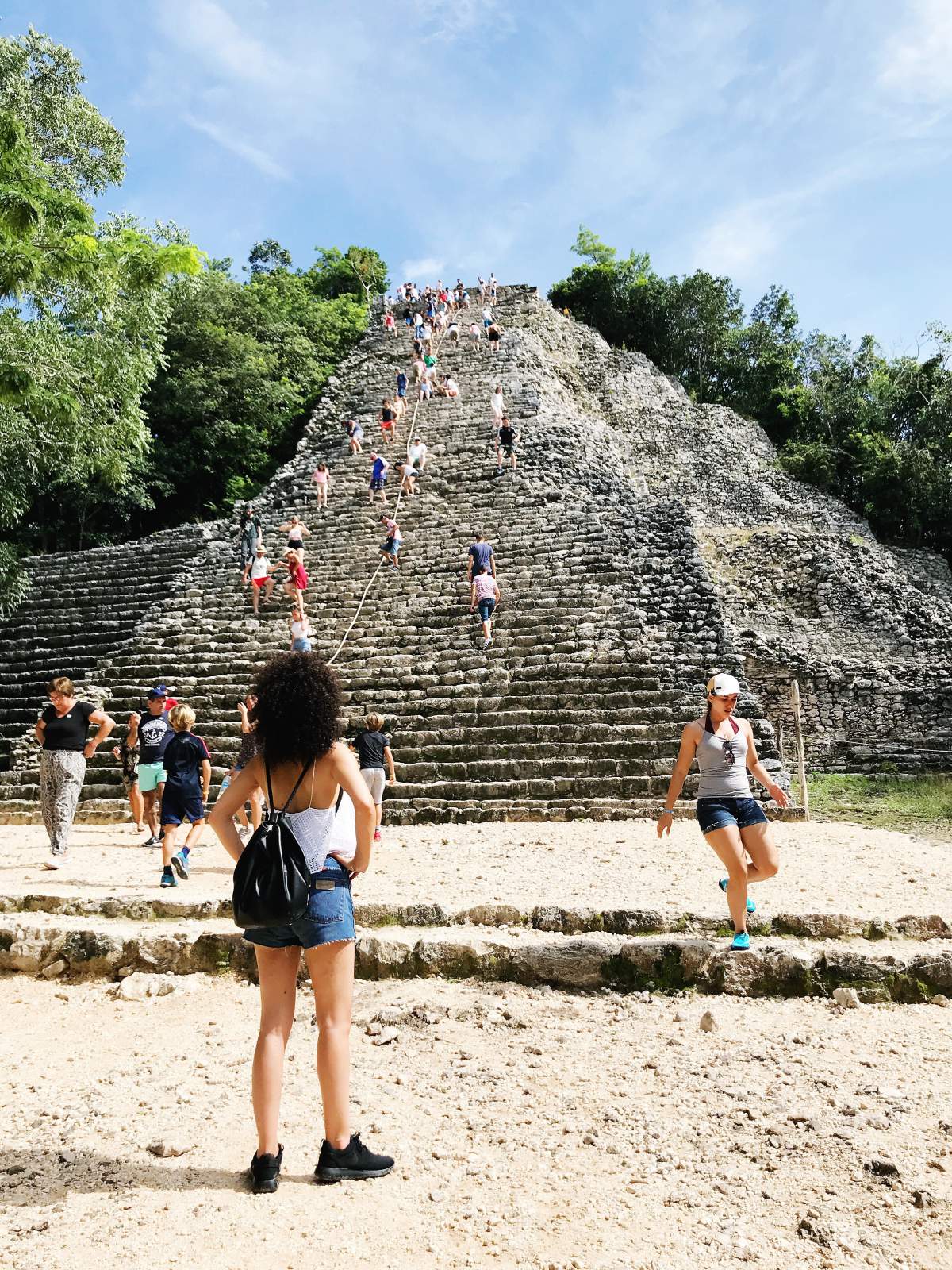 Hayla, Air Transat Flight Director, in front of the Coba mayan pyramid