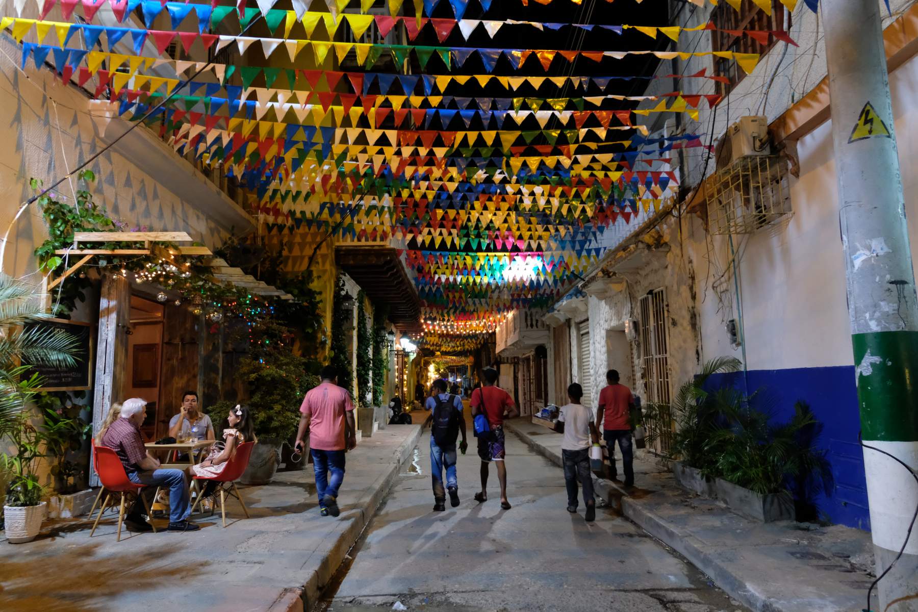 Festive street at night in Getsemaní, Cartagena, Colombia