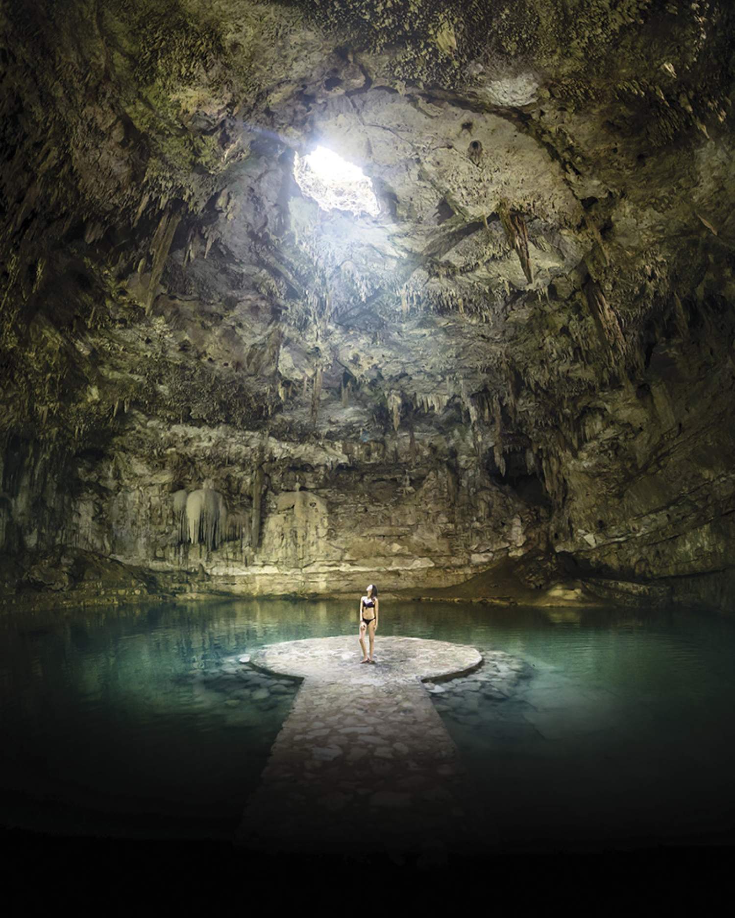 Lexie in a cenote, Yucatan, Mexico during her round-the-world trip